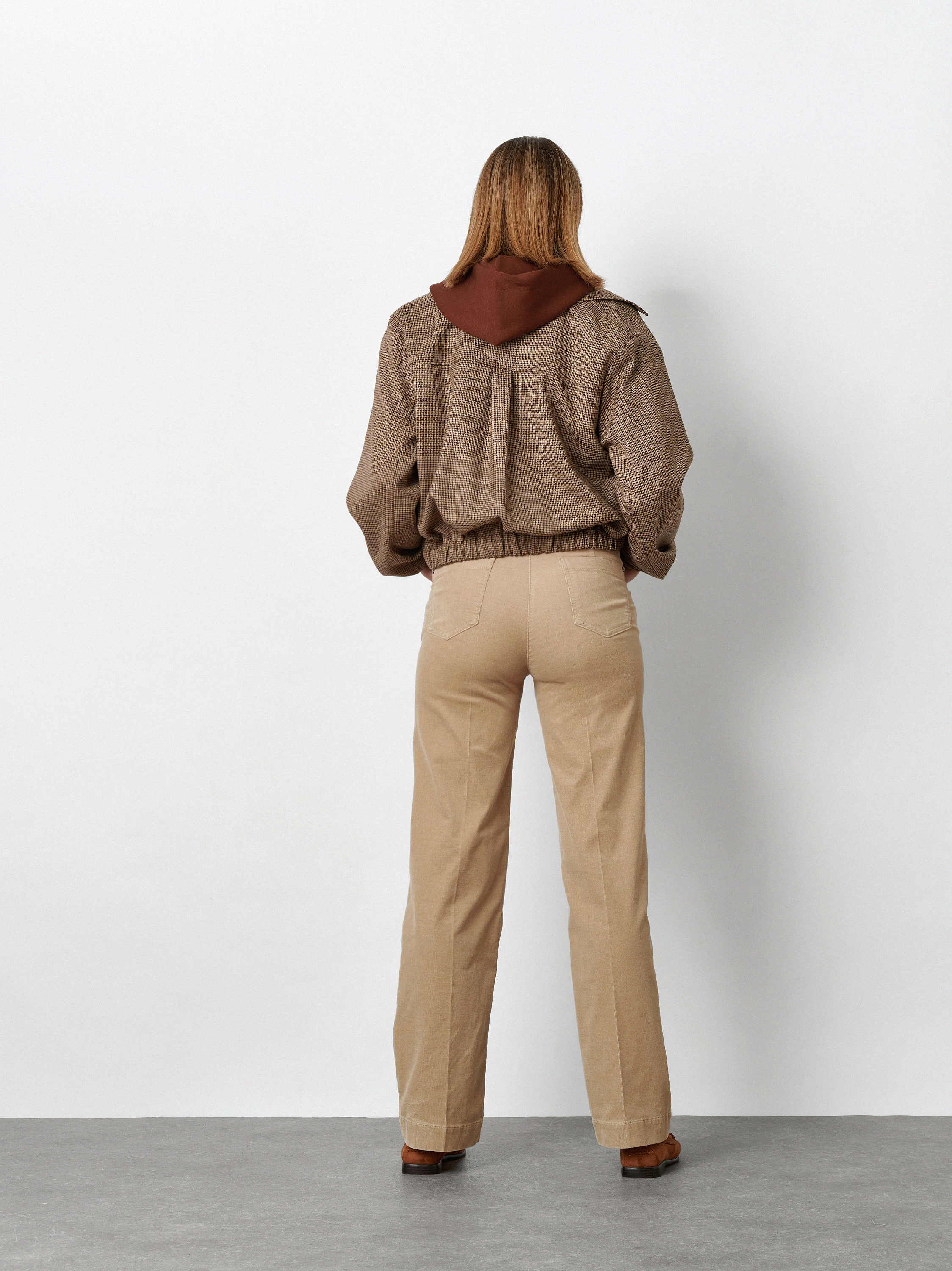 Womens trousers Jenny Wide in Sand, wide-leg corduroy trousers, back view worn by model