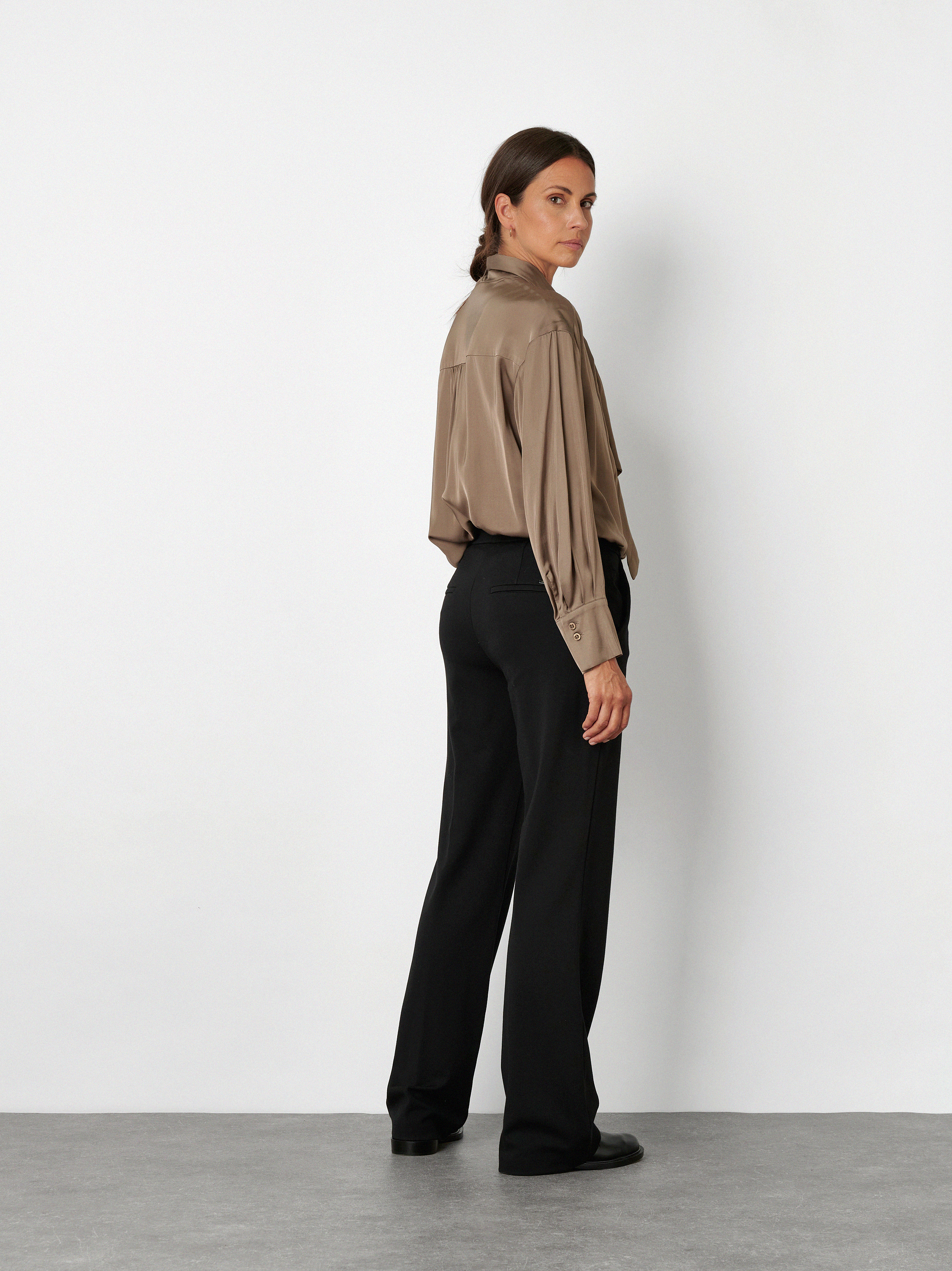 Womens trousers Jenny Wide in Black, wide-leg jersey trousers, back view worn by model