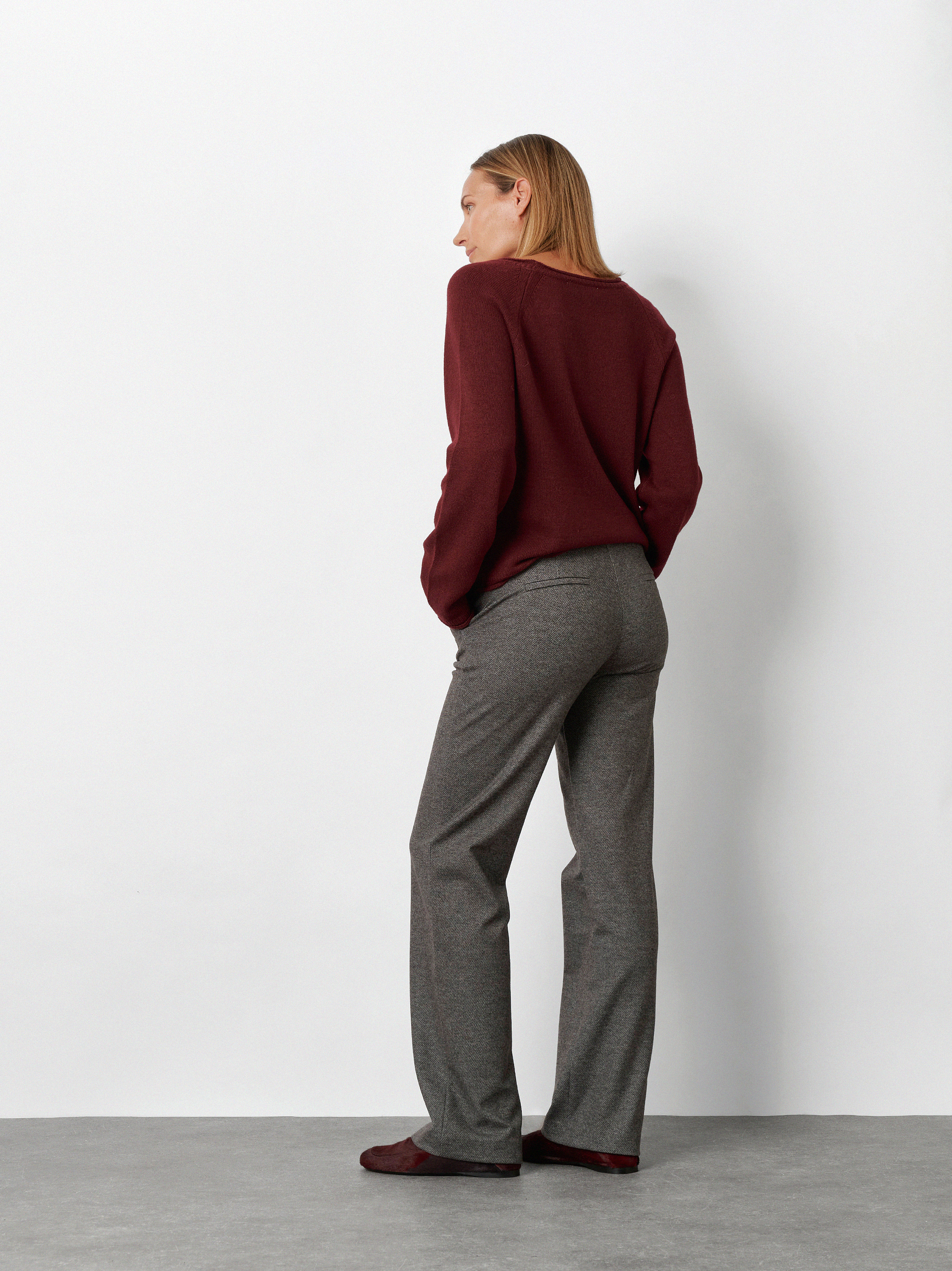 Womens trousers Jenny Wide in Dark Grey, wide leg trousers in a melange look, back view worn by model