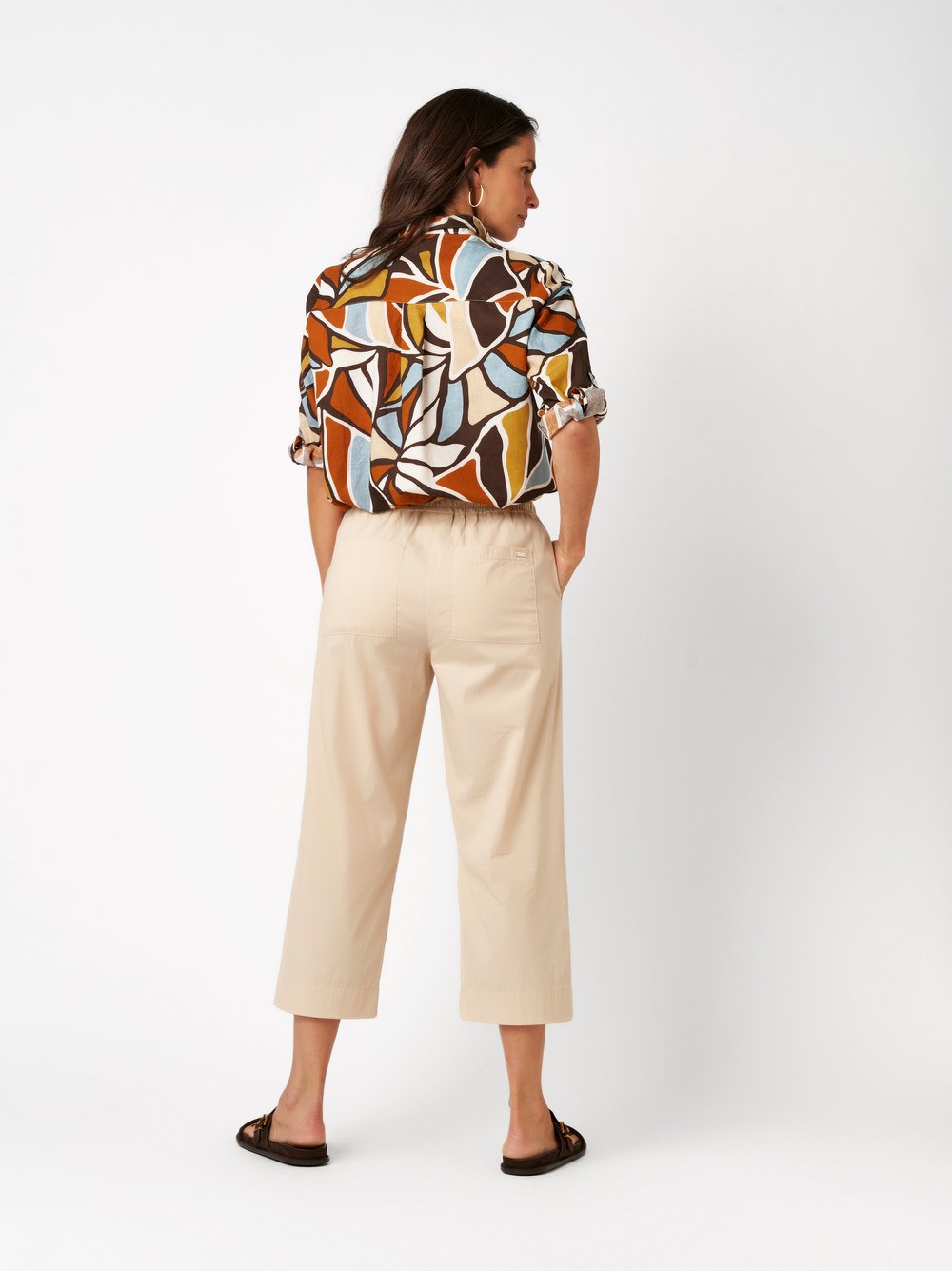 Womens blouse Clay in multicolour, relaxed linen shirt with an art-inspired floral pr, back view worn by model