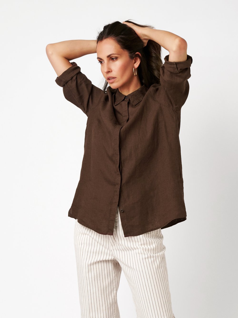 Womens blouse Clay in dark brown, relaxed linen shirt, front view worn by model