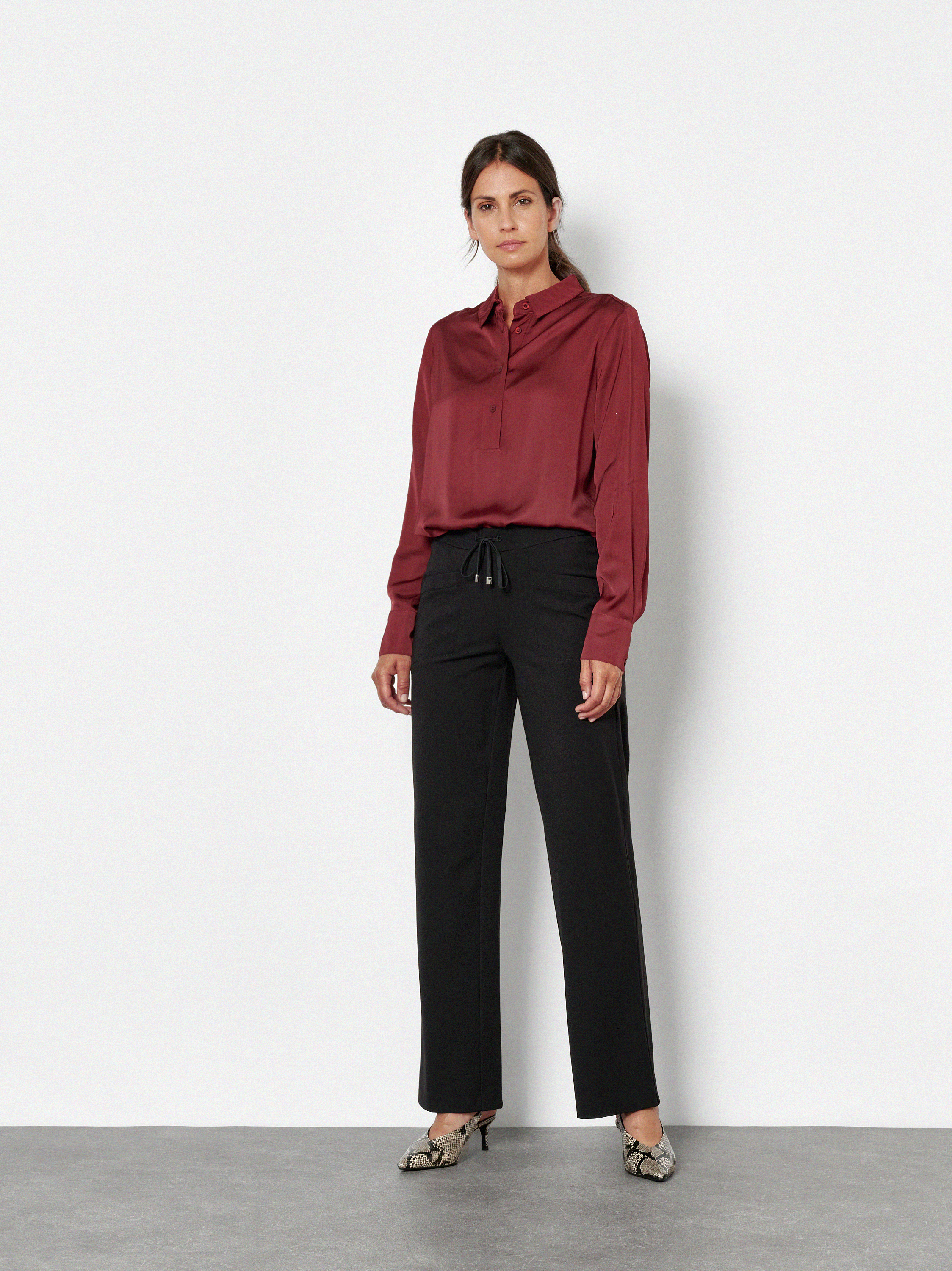 Womens blouse Celina in Rust, slip-on blouse with an elegant sheen, outfit view worn by model