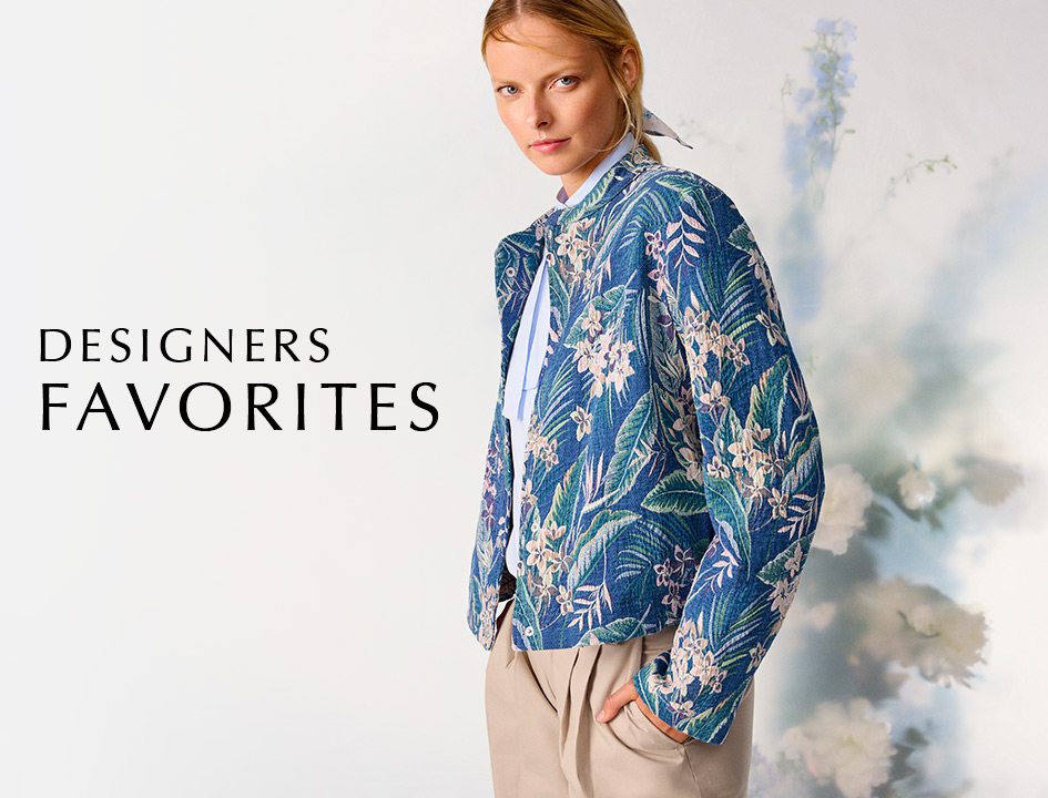 Model wearing a blue patterned jacket with light trousers and floral backdrop – teaser for TONI Designers Favorites