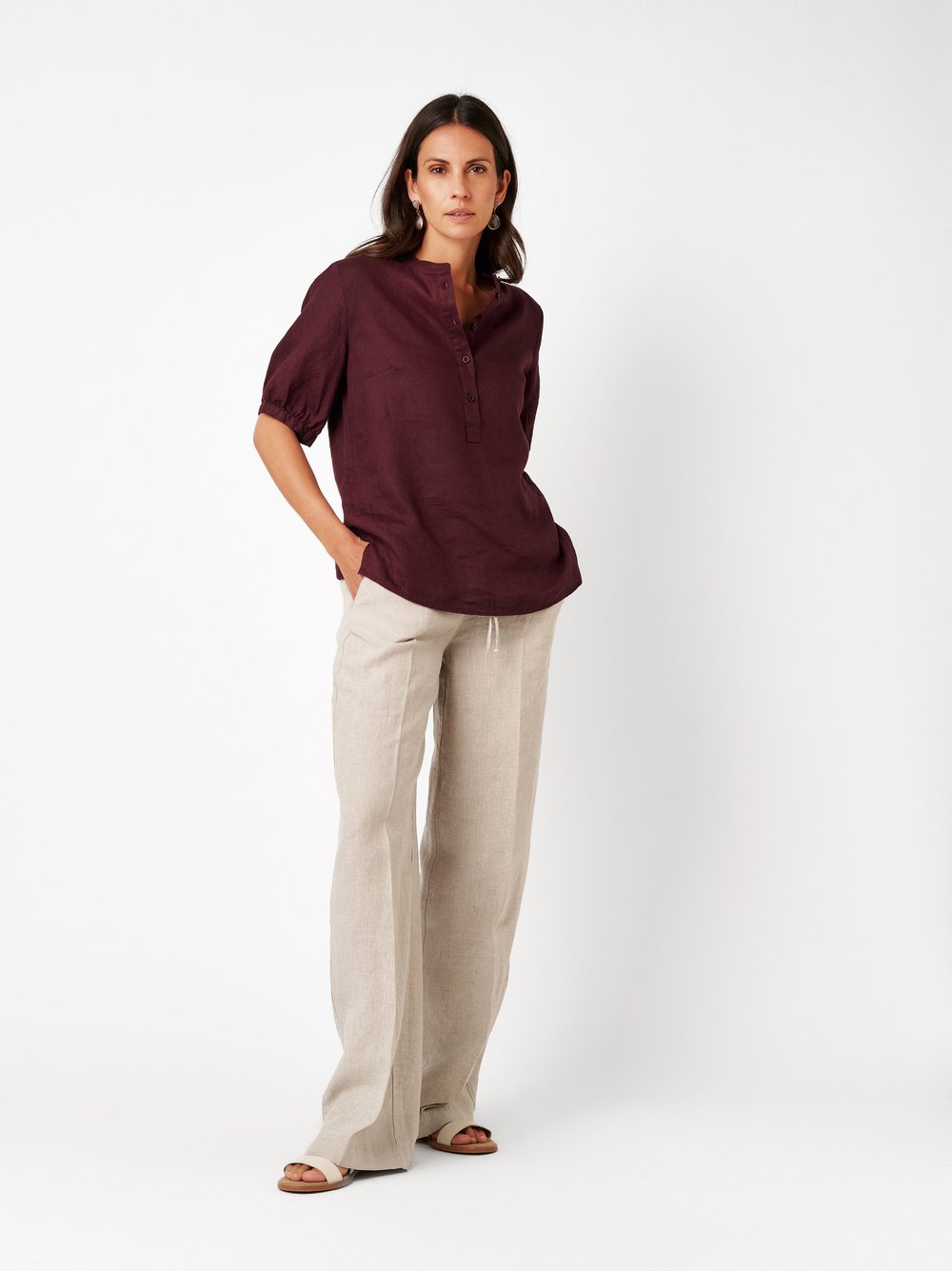 Womens blouse Alis in berry, linen blouse with a band collar, outfit view worn by model