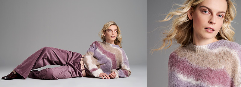 Woman in fluffy striped sweater and corduroy trousers by TONI – teaser for Cosy Favorites category.