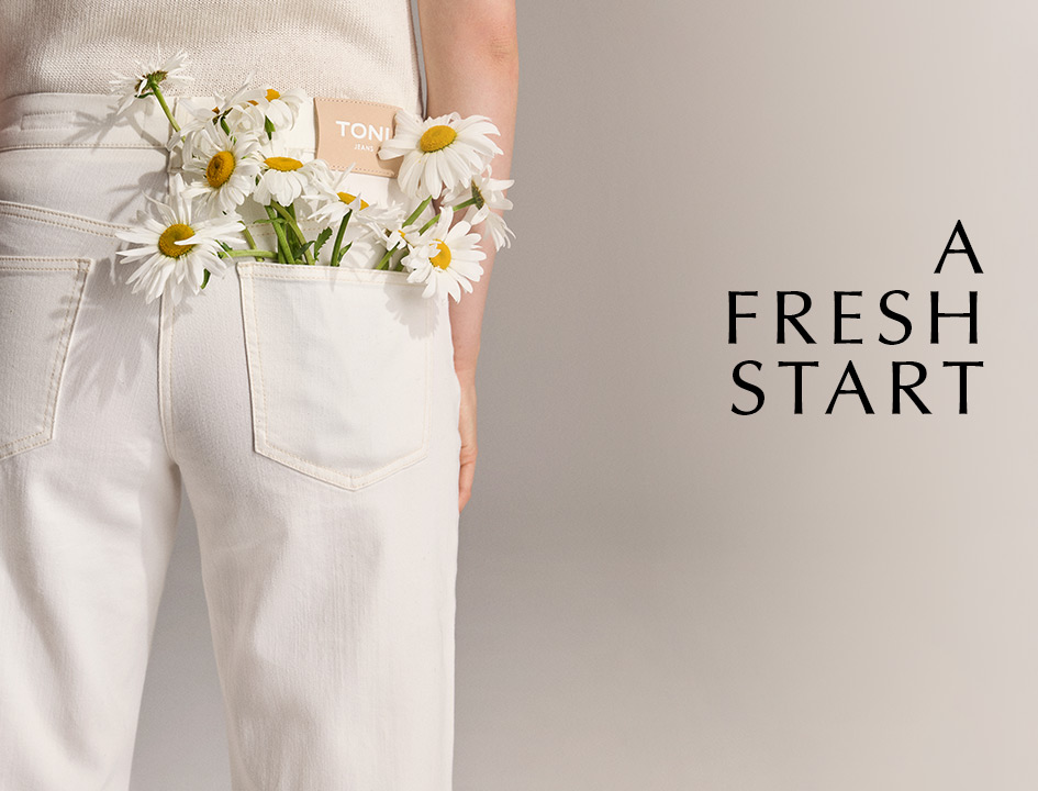 White TONI jeans with daisies tucked into the back pocket – fresh teaser for the spring new arrivals