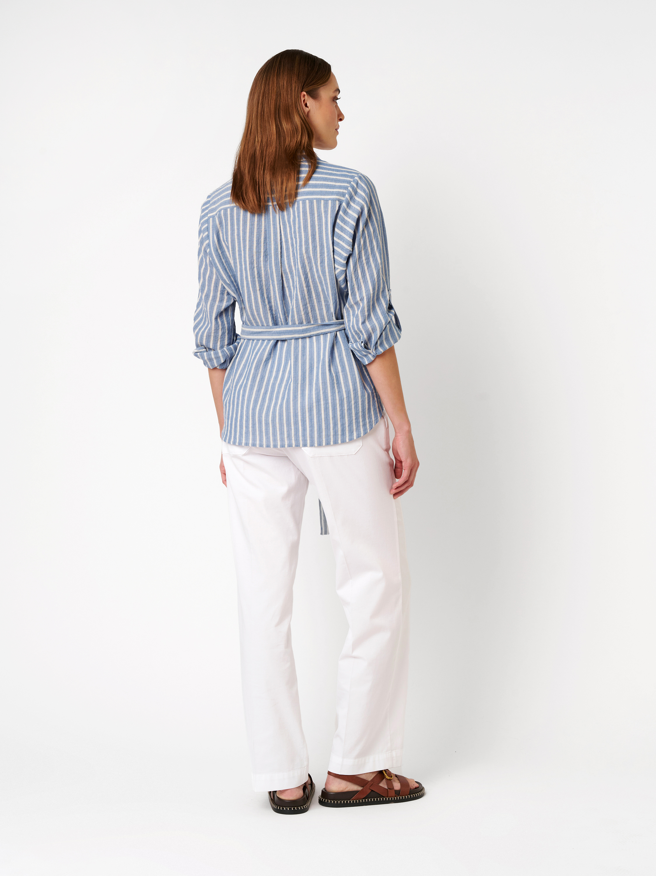 Womens blouse Caja in blue / offwhite, striped belted blouse, back view worn by model