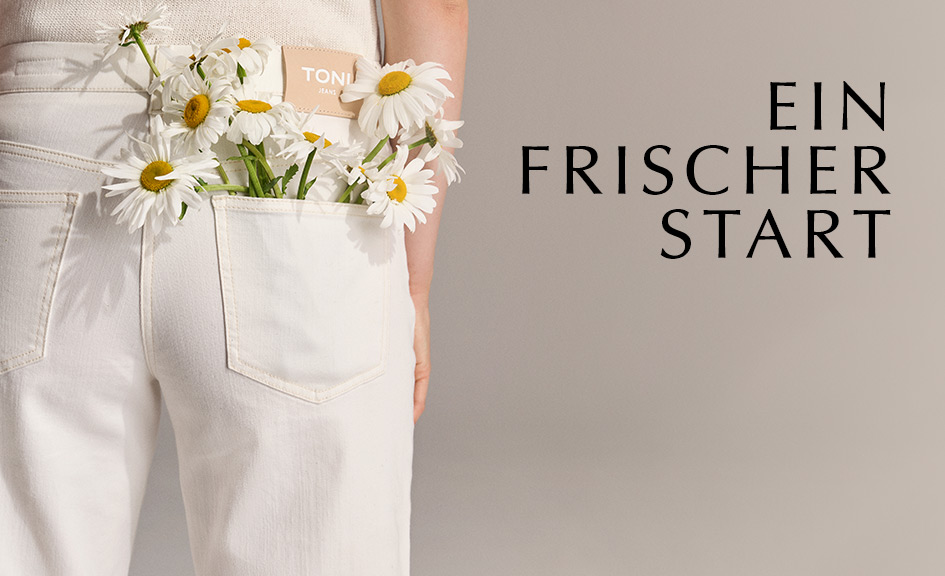 Modell trägt weiße TONI Jeans mit Gänseblümchen in der Gesäßtasche – Teaser zur Kategorie Neuheiten mit frischem Saisonstart