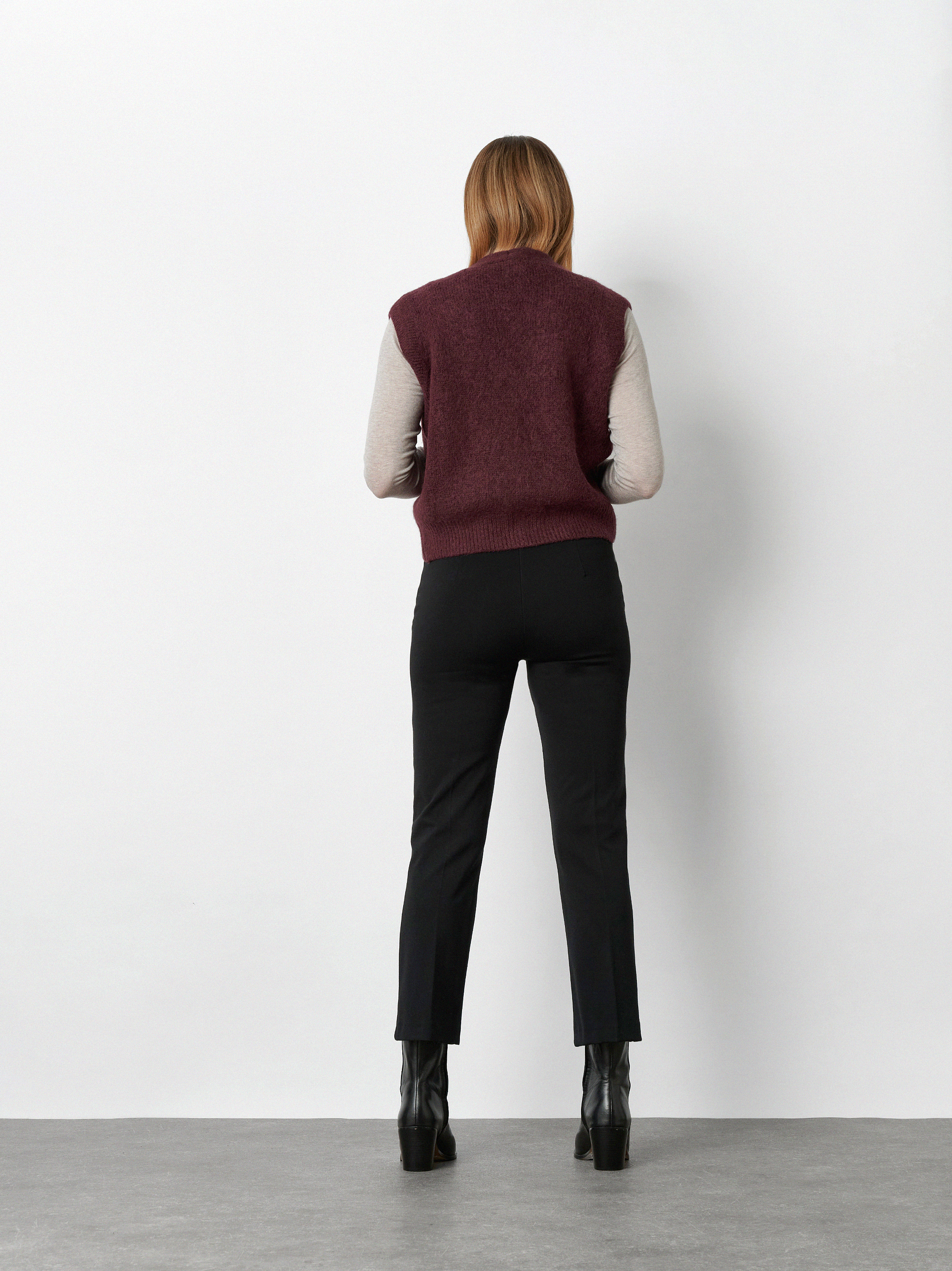 Womens trousers Jenny in Black, 7/8 flared jersey trousers, back view worn by model