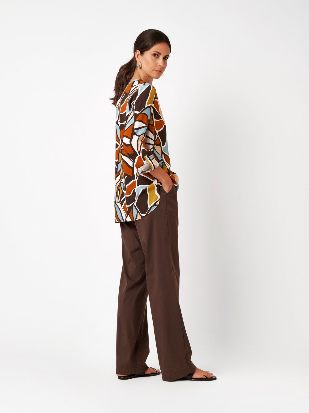 Womens blouse Bella in multicolour, silky blouse with an art-inspired floral print, back view worn by model