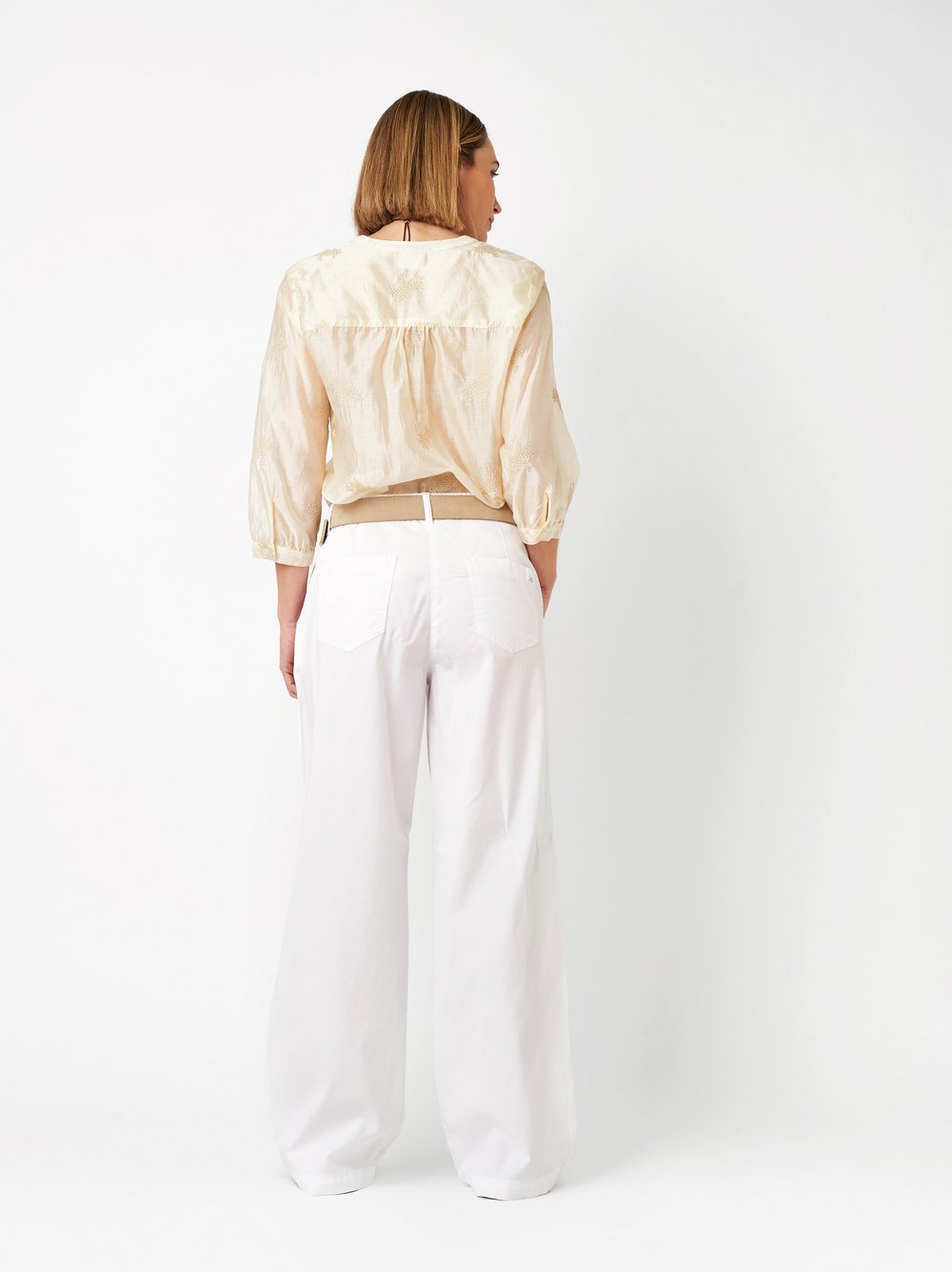 Womens blouse Bella in beige, tunic with a floral embroidery, back view worn by model