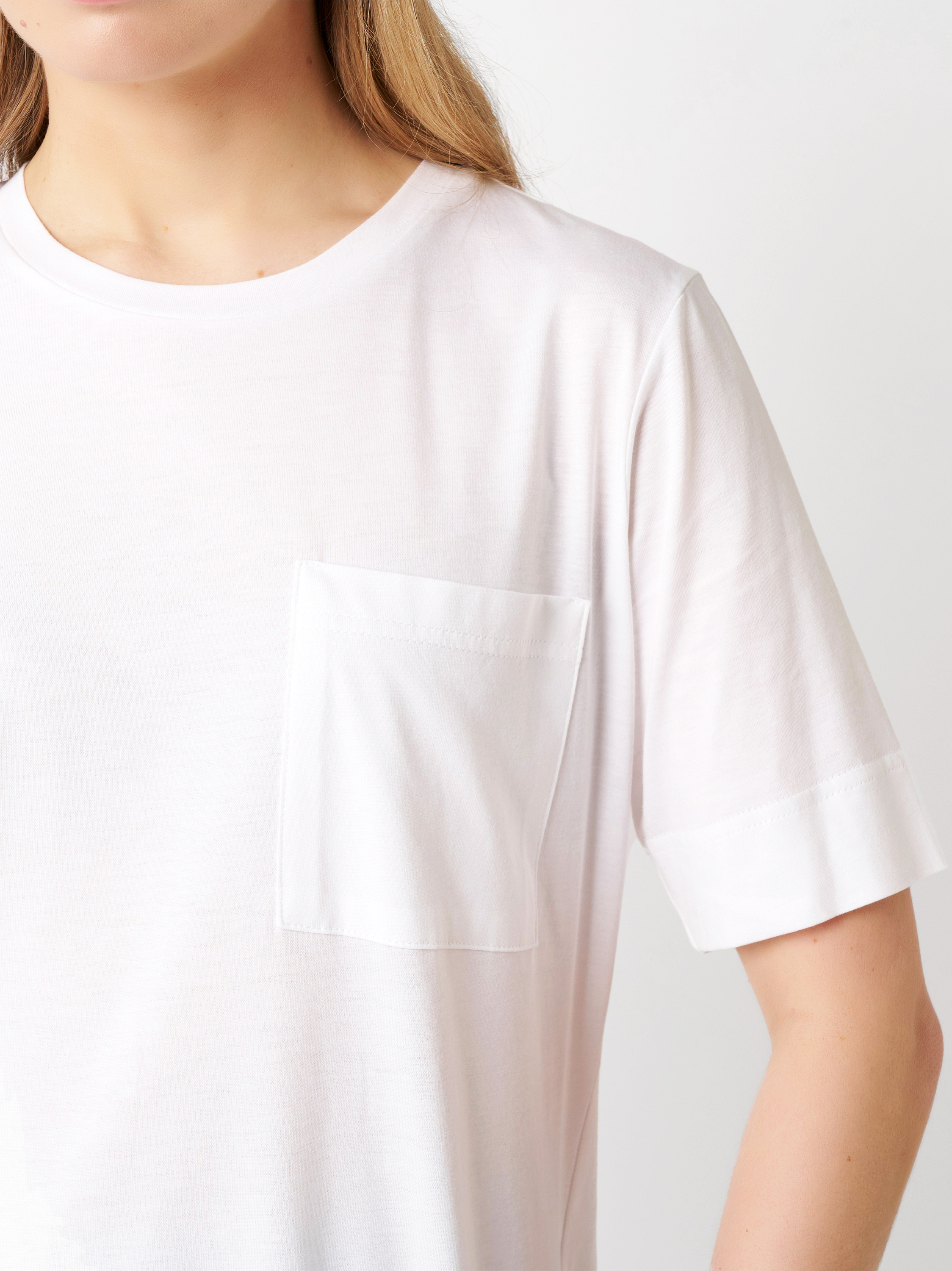 Womens shirt Dolly in white, summer tee with chest pocket, detail view
