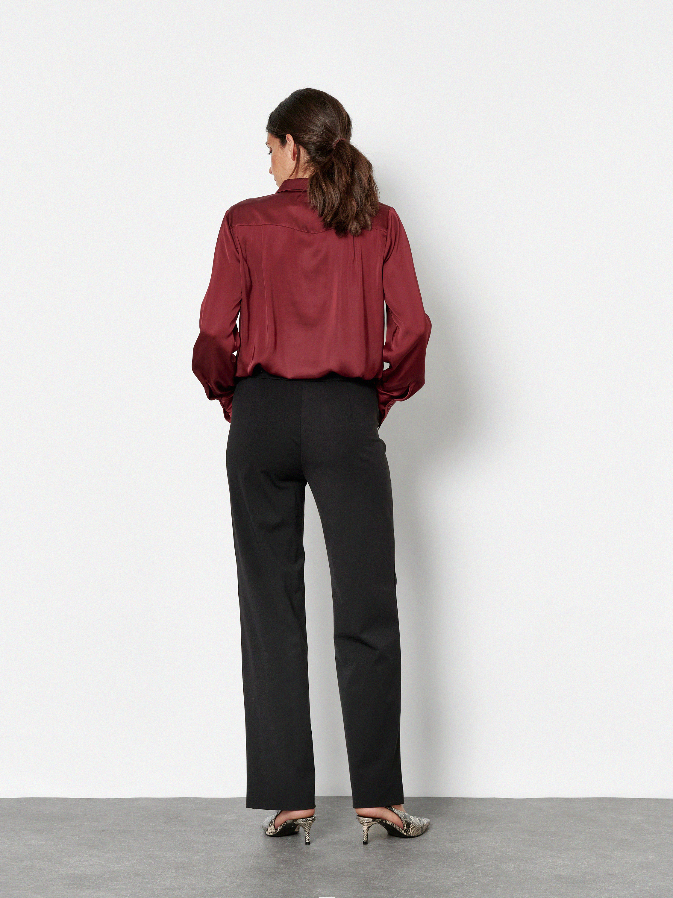 Womens blouse Celina in Rust, slip-on blouse with an elegant sheen, back view worn by model