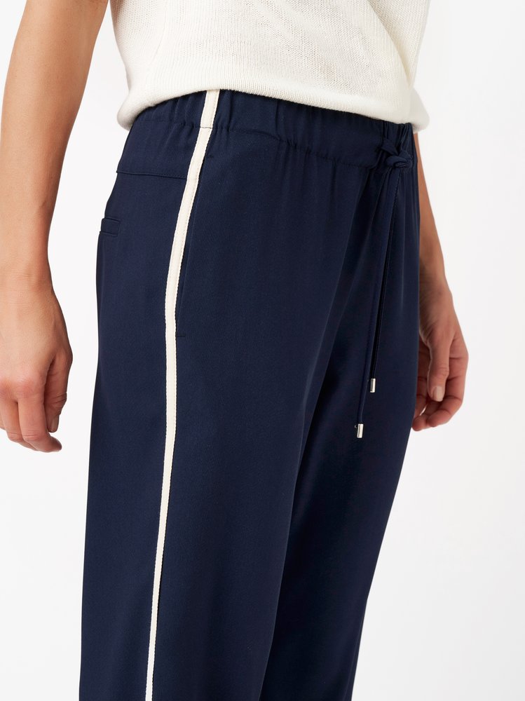Womens trousers Sue Wide in dark blue, wide-leg jogpants with side stripes, detail view